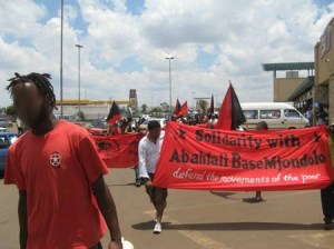 Anarchist banners at Abahlali baseMjondolo Solidarity, Soweto, 5 December 2009